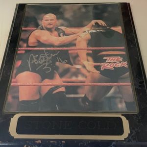 Stone cold WWF signed picture in a plaque